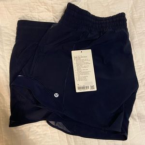 Lululemon Hotty Hot High Rise 4in in True Navy size 14